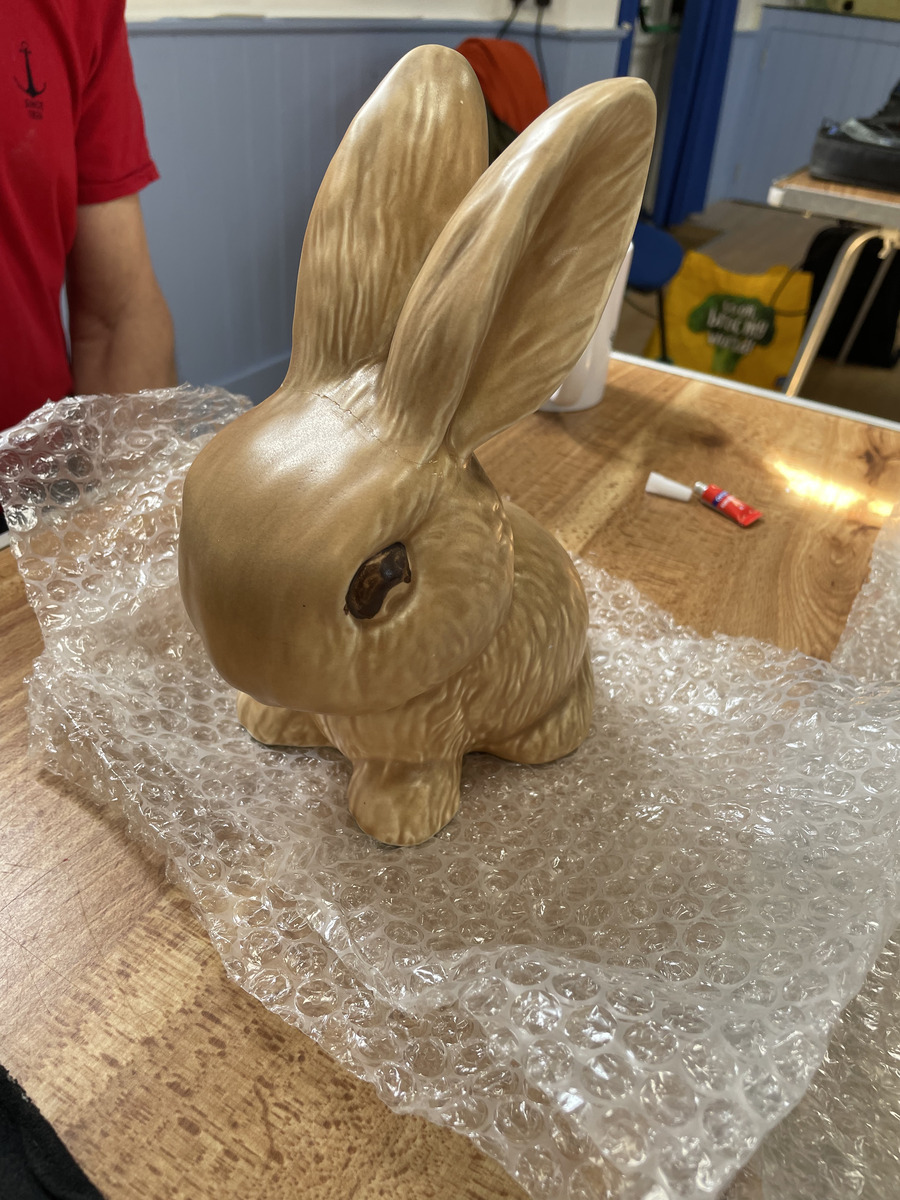 A rabbit ornament on bubble wrap at the Repair Café