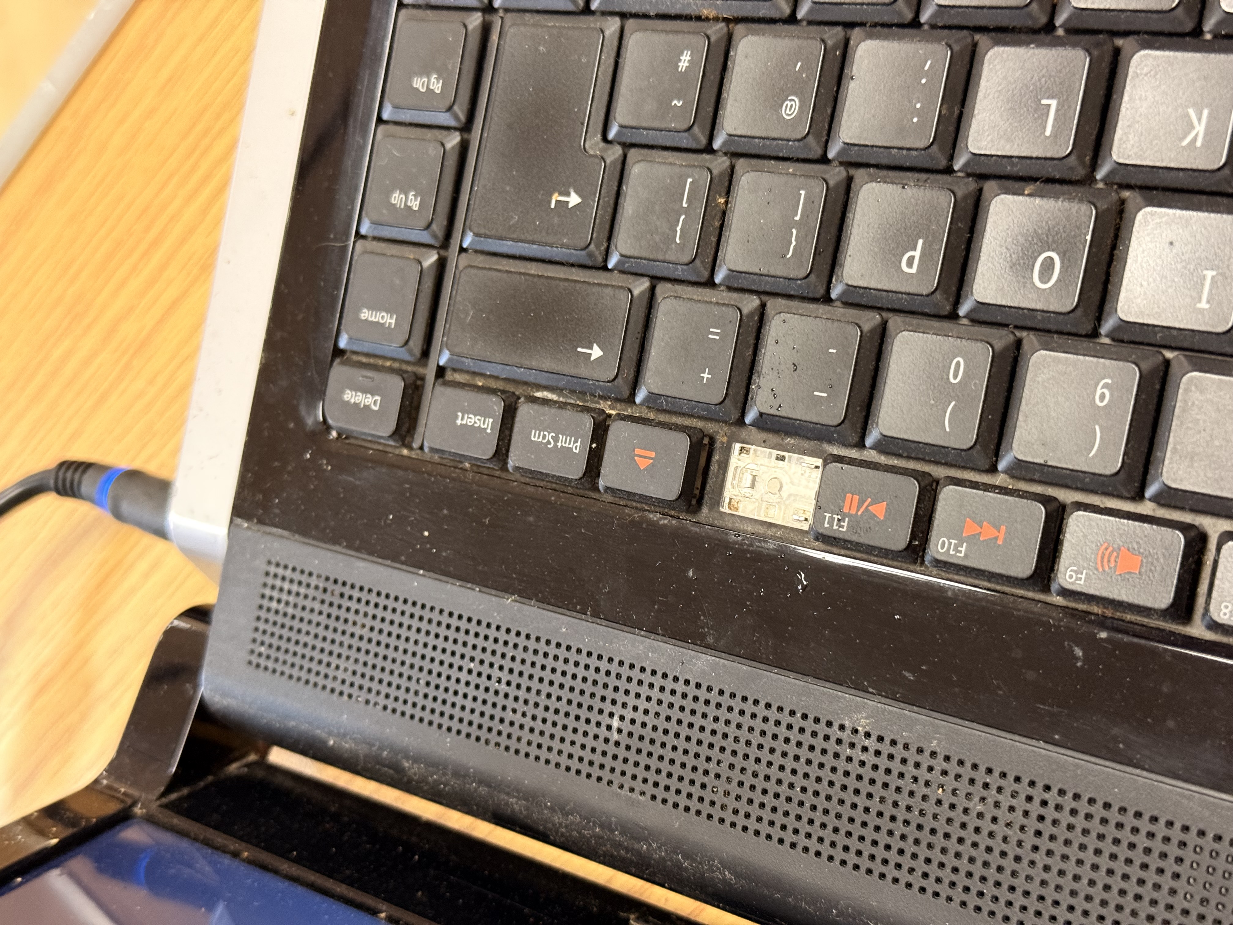 Laptop keyboard showing wear
