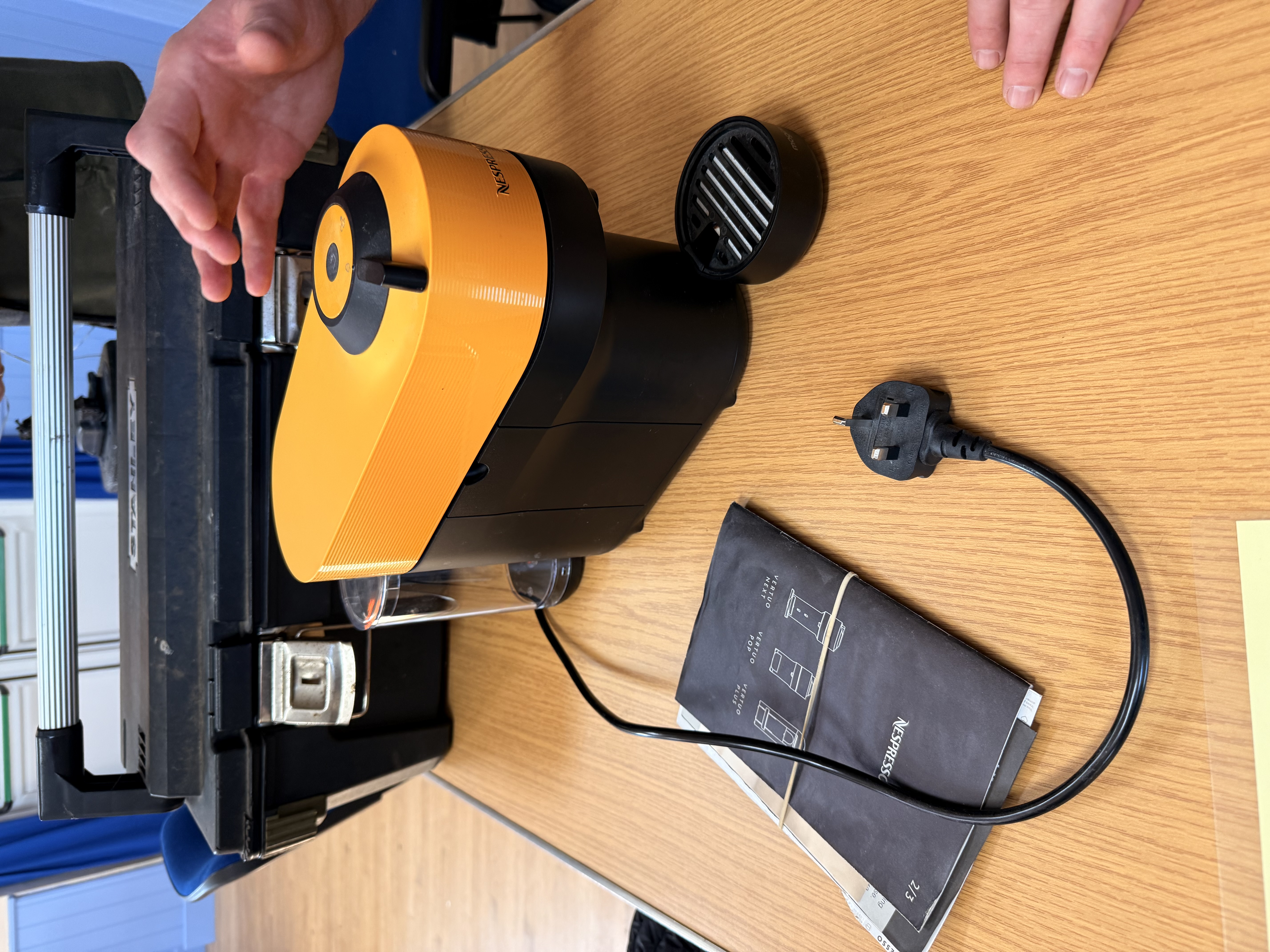 Nespresso coffee machine being assessed