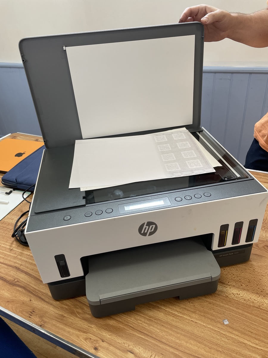 A printer being inspected at Tregony Repair Café