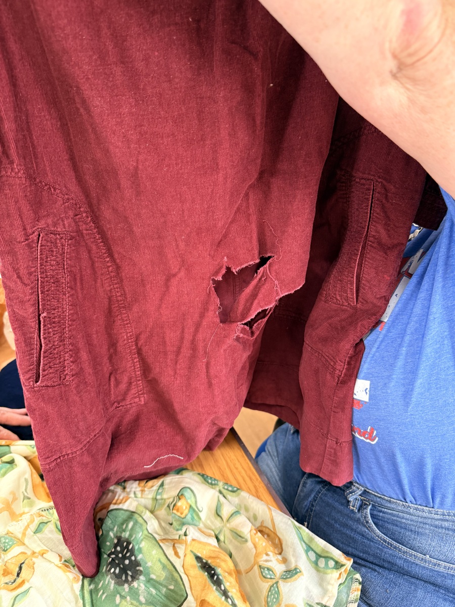 A dress brought in for textile repair at Tregony Repair Café