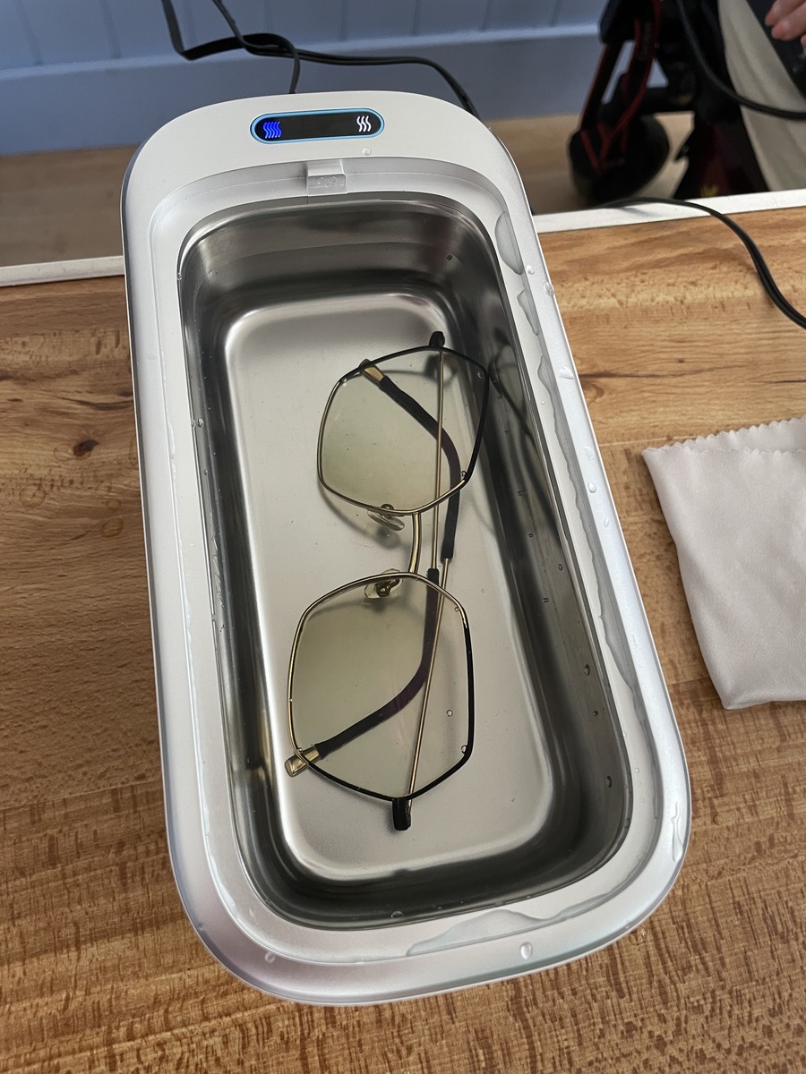 Glasses being cleaned at Tregony Repair Café