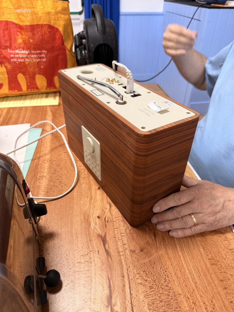 A radio and CD player opened for inspection at Tregony Repair Café