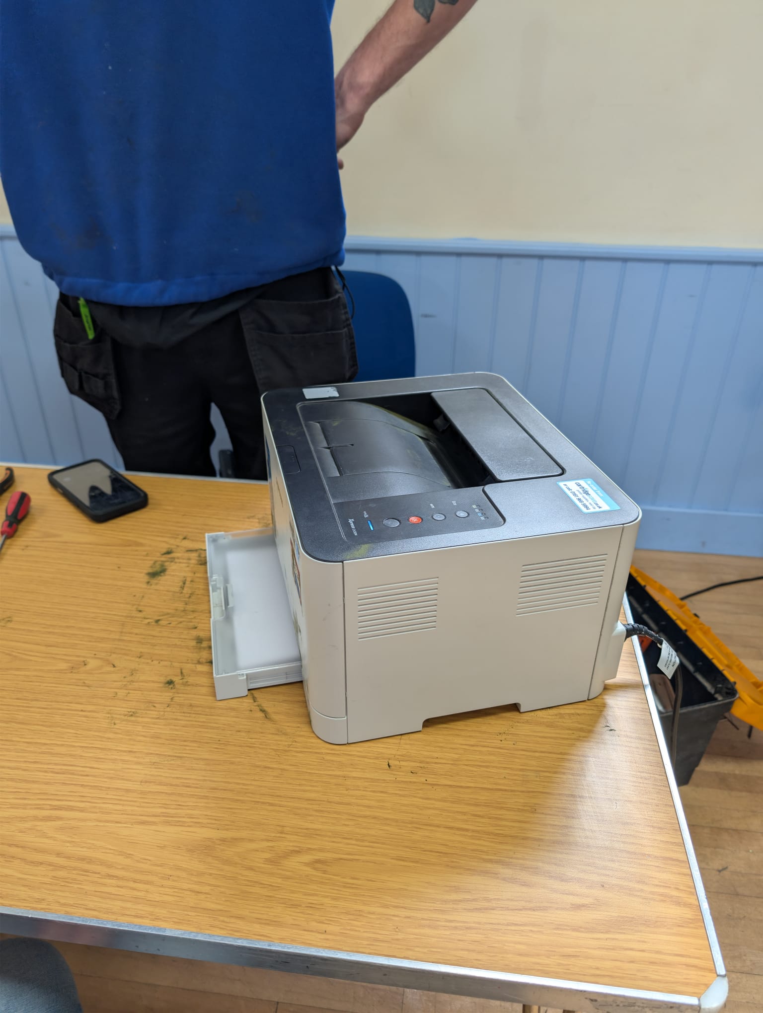 Laser printer being examined