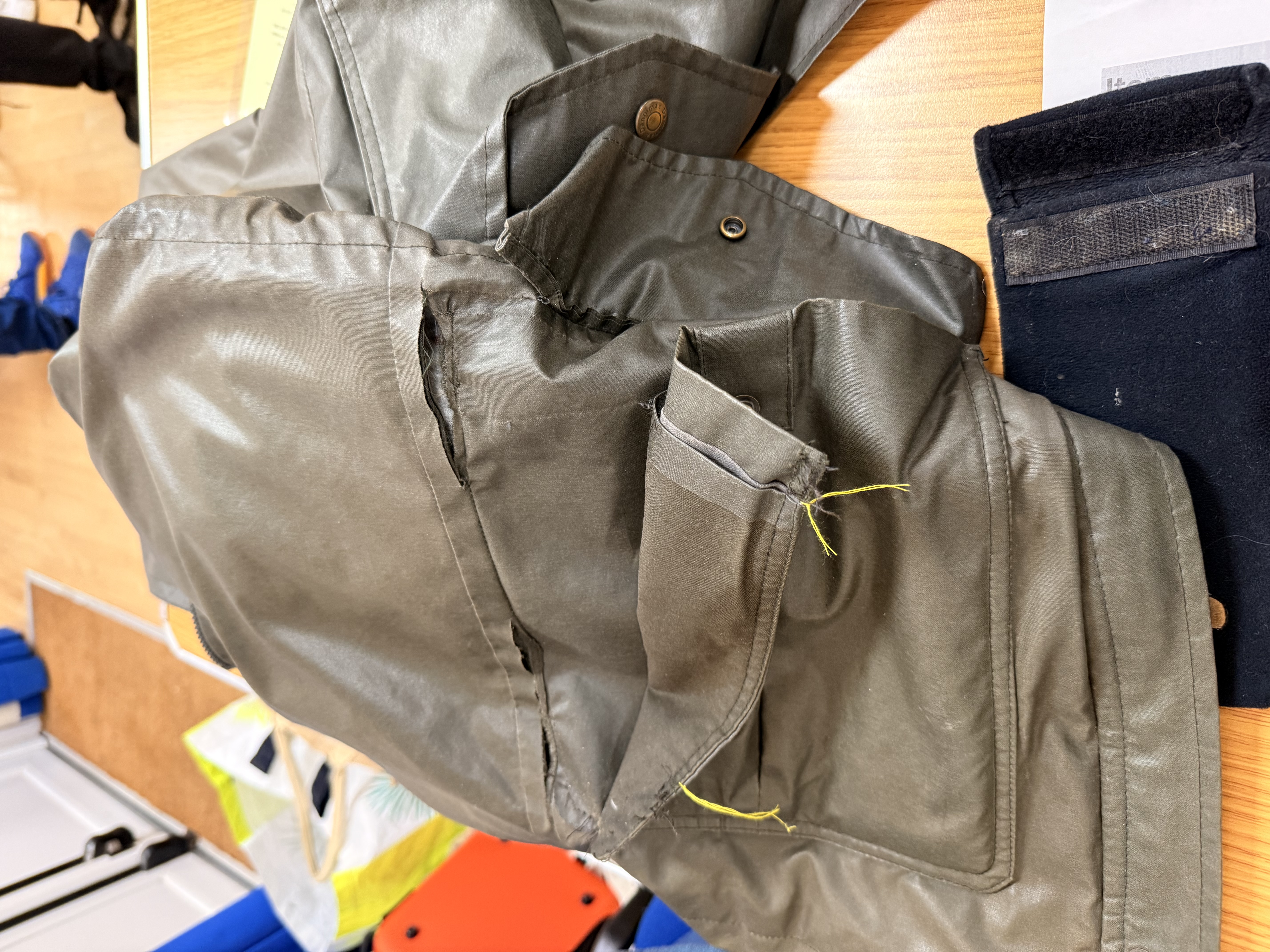 Jacket pocket repair in progress