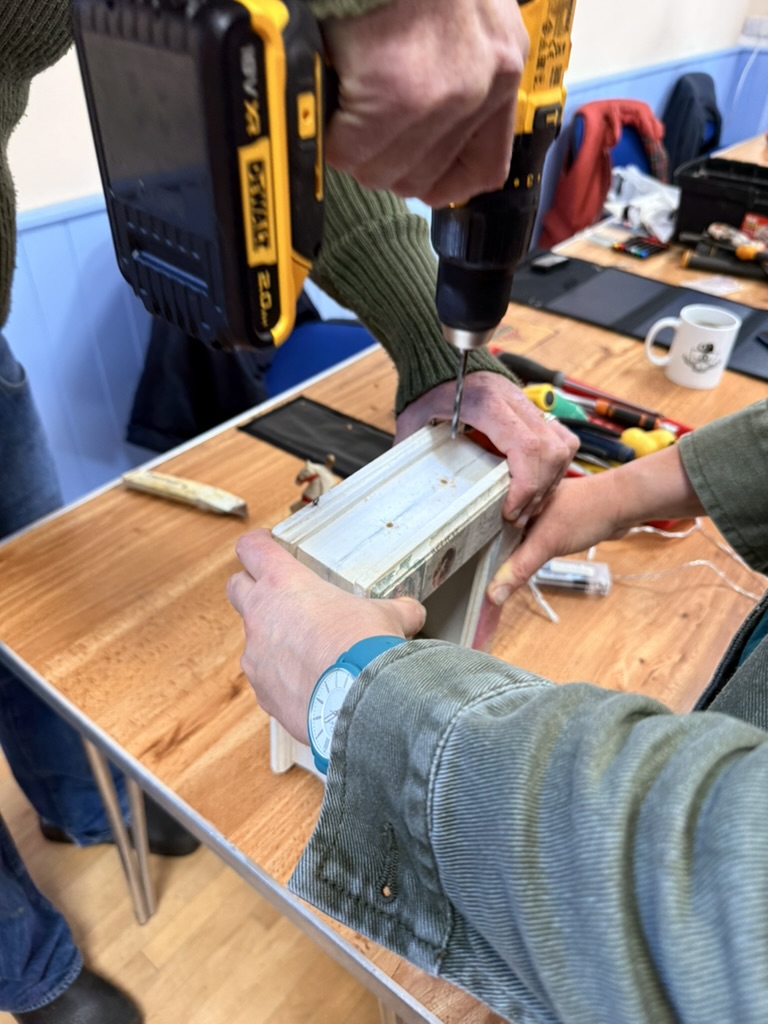 Art piece being drilled