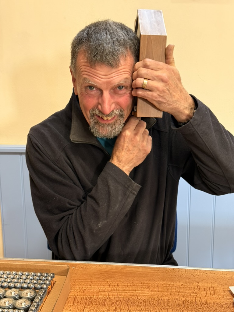 Gary listening closely to cuckoo clock