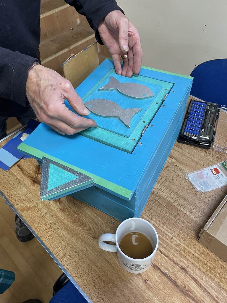 Blue wooden box repaired